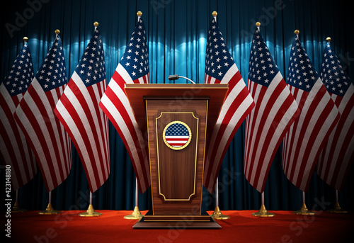 Photo Group of American flags standing next to lectern in the conference hall