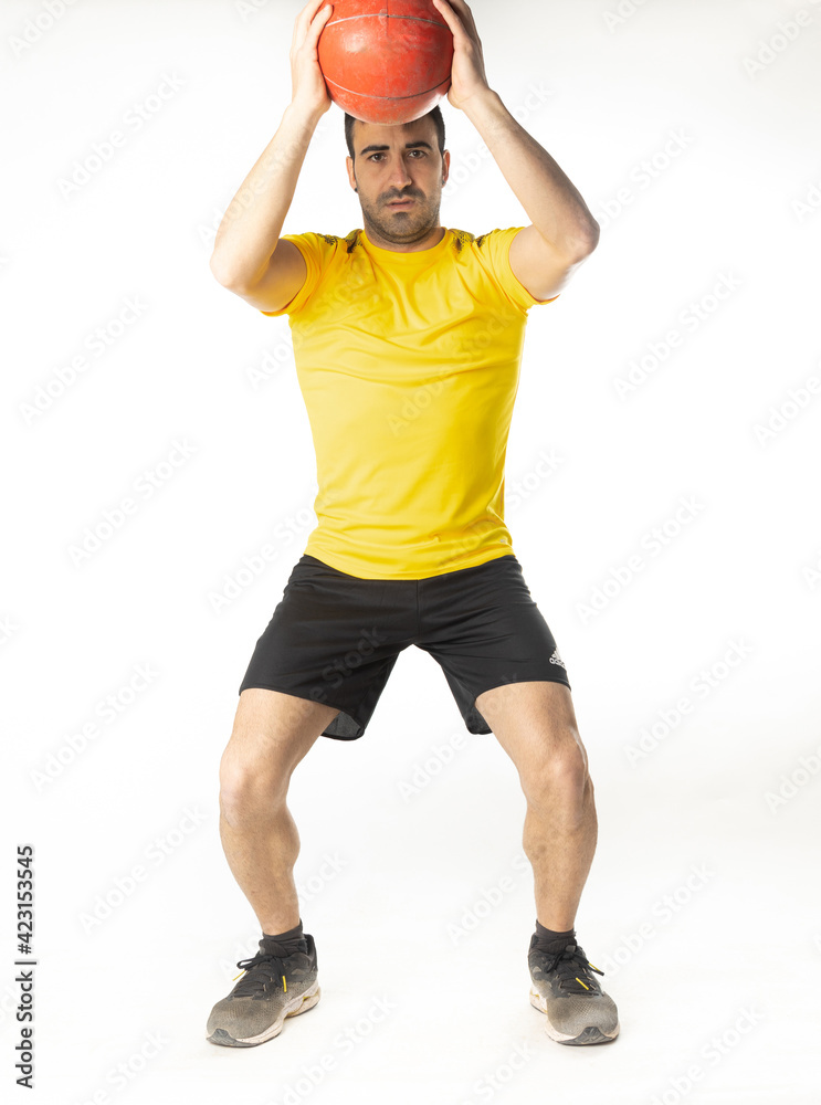 man exercising with medicine ball on white background man exercising with medicine ball on white background