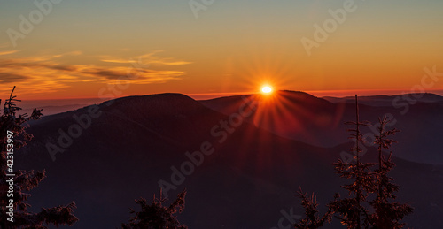 Sunset from Lysa hora hill in Moravskoslezske Beskydy mountains in Czech republic