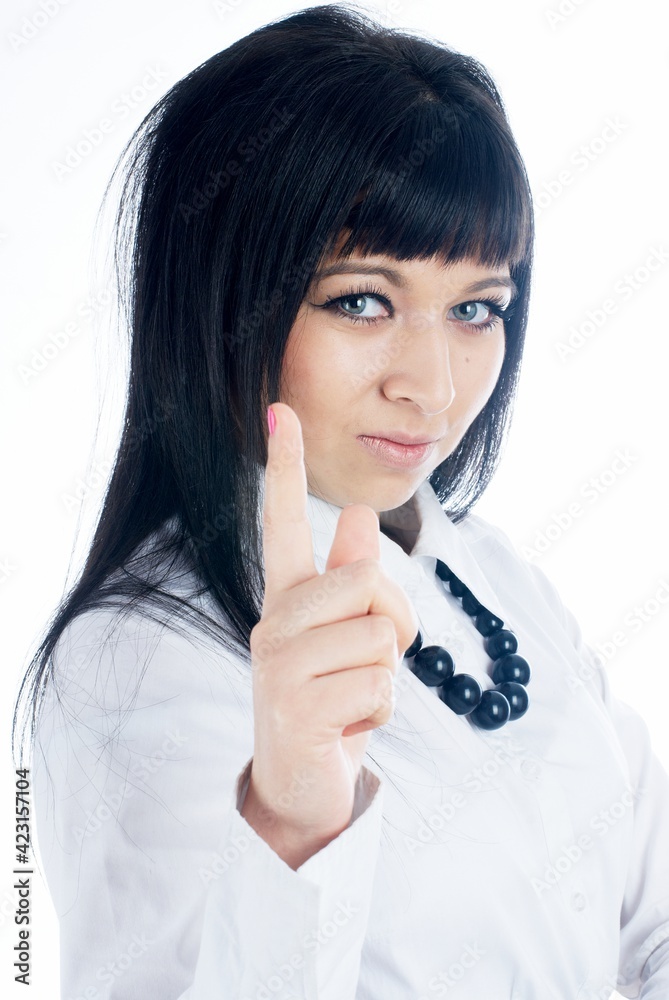Attractive young woman with her finger up Attractive young woman with her finger up