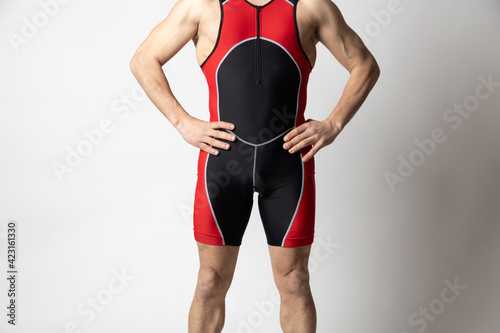 man wearing triathlon suit white background