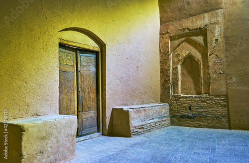 The corner of old building in Yazd, Iran photo