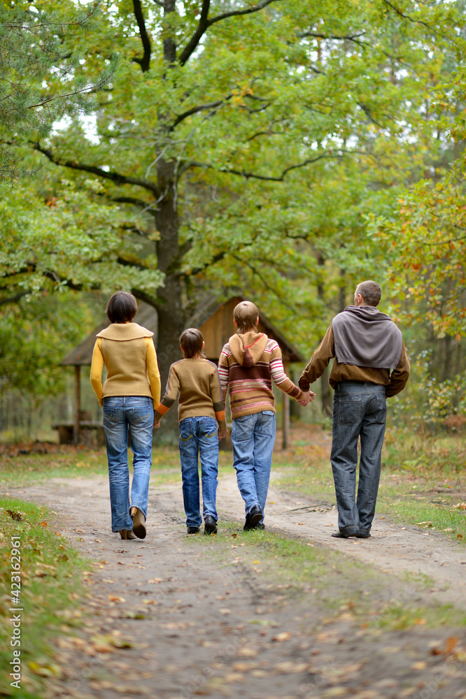 Family of four in park