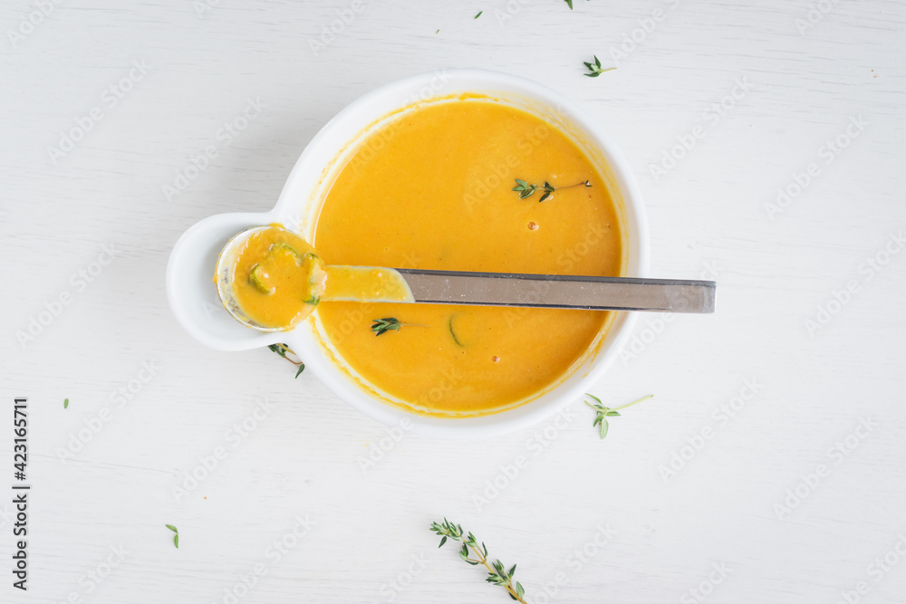 Yellow vegetable soup with thyme herbs Yellow vegetable soup with thyme herbs