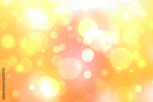 Abstract festive blur bright yellow orange pastel background texture with glowing circular bokeh lights and stars for Mothers day, valentine or wedding card. Space for design. Card concept.