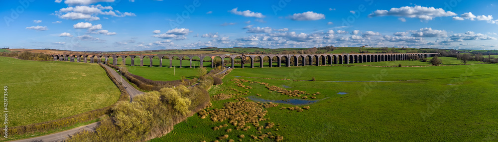 A view above the Welland Valley with the backdrop of the Welland Valley viaduct on a bright sunny spring day in the UK