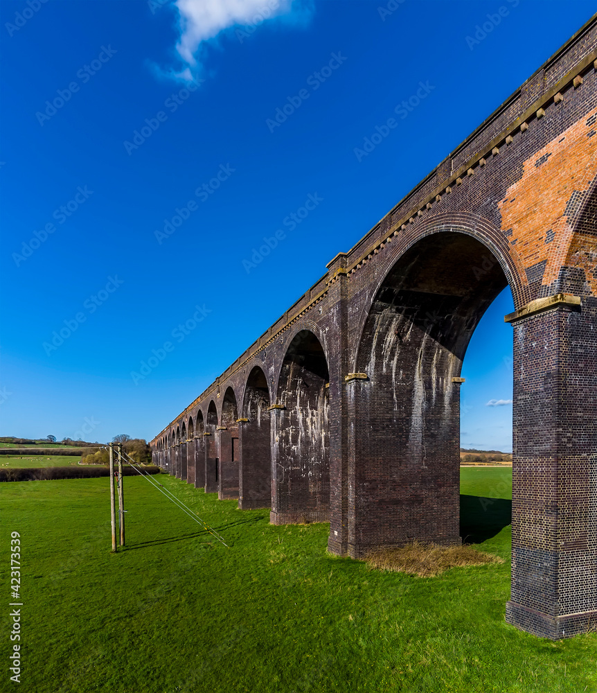 A view of the west section of the largest brick viaduct in the UK, the Welland Valley viaduct on a bright sunny spring day 