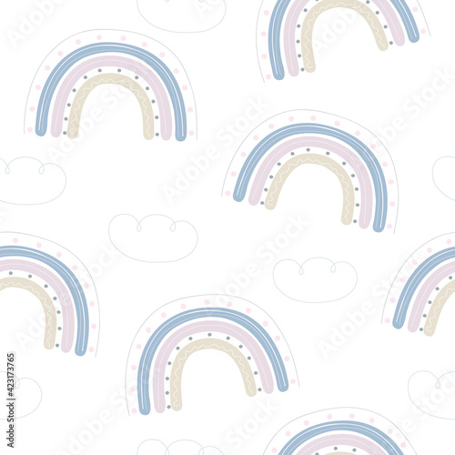 Cute seamless pattern with rainbow. Ideal for fabrics and newborn bedroom decor.