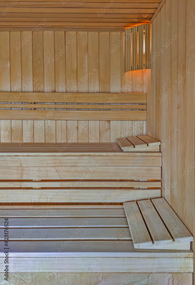 Interior of the empty new wooden sauna Interior of the empty new wooden sauna