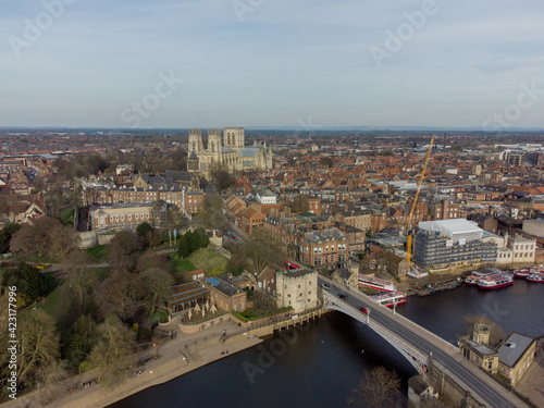 York city centre and York Minster aerial view from over the River Ouse showing bridge and historic city in Yorkshire, northern England © Chris