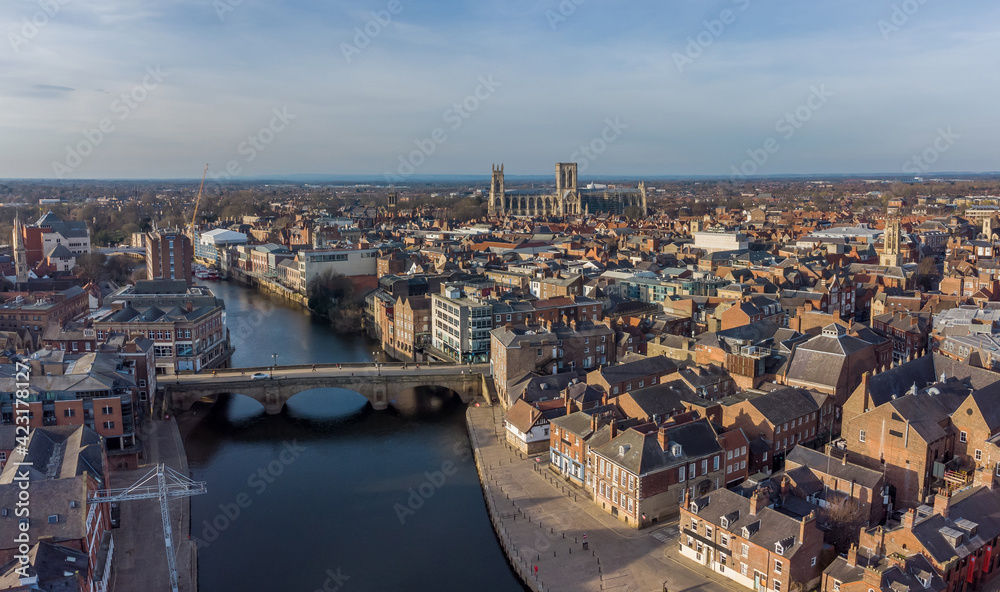 York city centre and York Minster aerial view from over the River Ouse showing bridge and historic city in Yorkshire, northern England