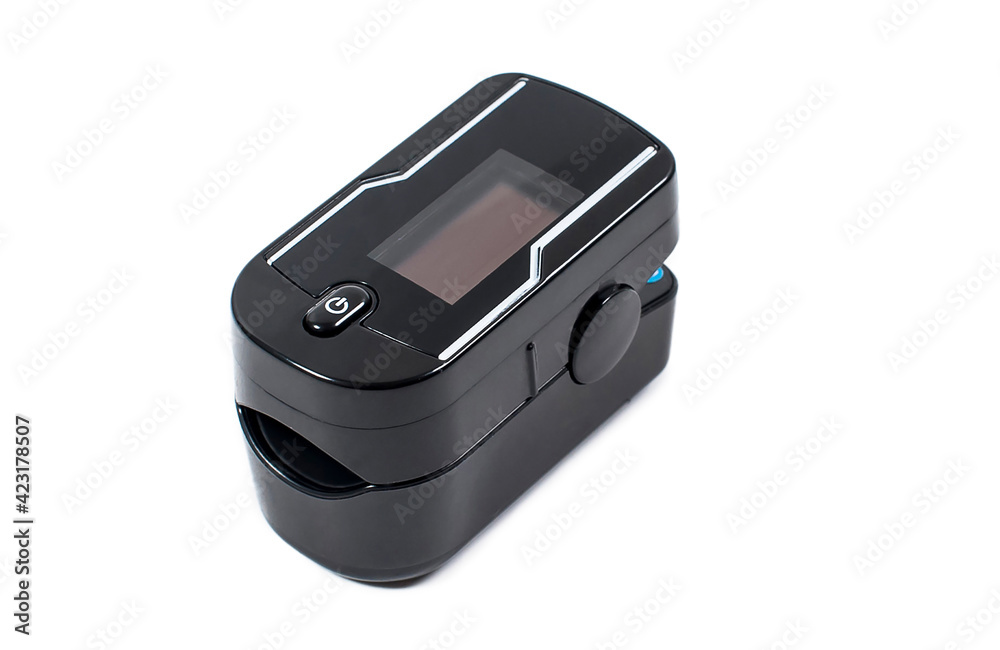 Black pulse oximeter close-up. Isolated on white background. Measurement of blood oxygen level and pulse Black pulse oximeter close-up. Isolated on white background. Measurement of blood oxygen level and pulse