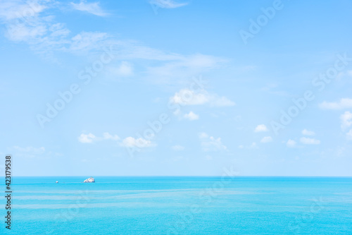 Beautiful nature of sea ocean with white cloud and blue sky