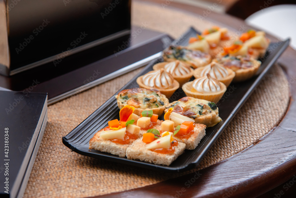assorted of delicious canepes on tray assorted of delicious canepes on tray