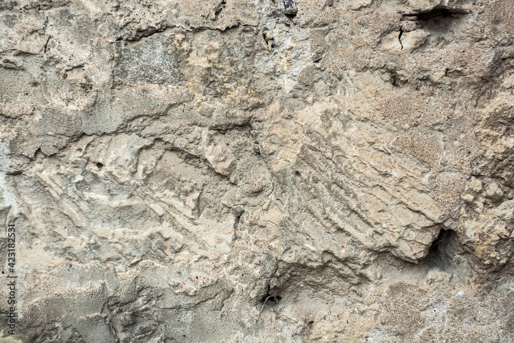 concrete wall with rough smears of cement gray background. concrete wall with rough smears of cement gray background.