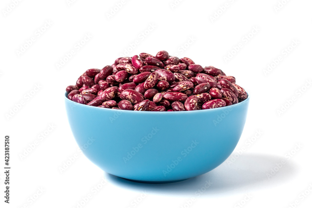 Red kidney beans in blue bowl isolated on white background Healthy eating, vegetable protein concept Flat lay Top view