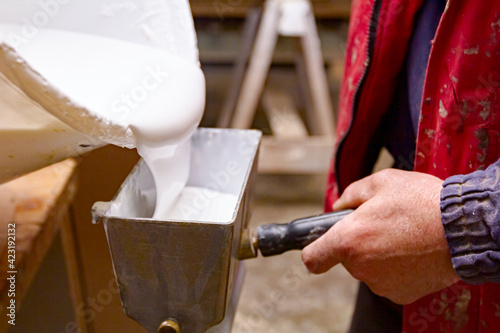 Tableau sur toile Hand roller, adhesive spreader for evenly application of glue on the wooden surf