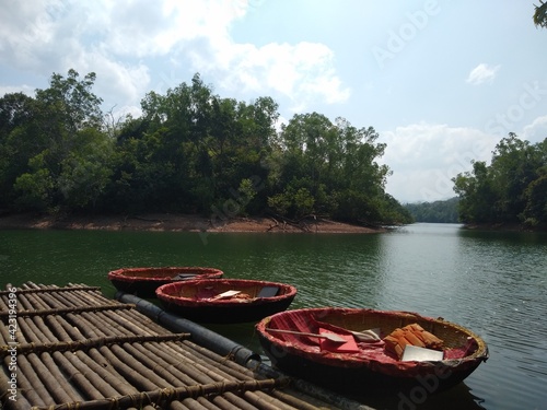 coracle boat on the river, Kottur ecotourism, Kuttavanchi Savari, Thiruvananthapuram Kerala photo