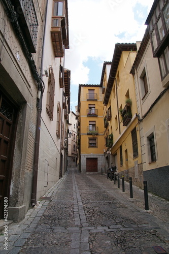 Toledo town street view with historical buildings in Spain. © khalid