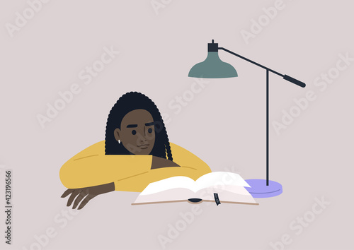 A young female Black character leaning on arms and reading a book, educational process, a university student preparing for exams