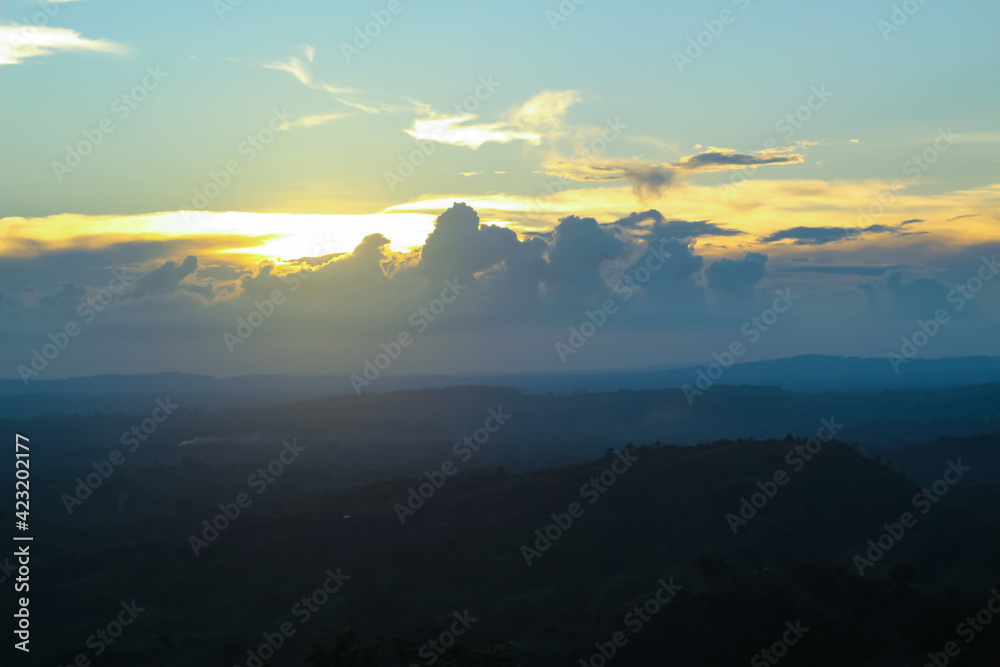 sunset scenery with cloudy weather above the hill in sajek valley in bangladesh