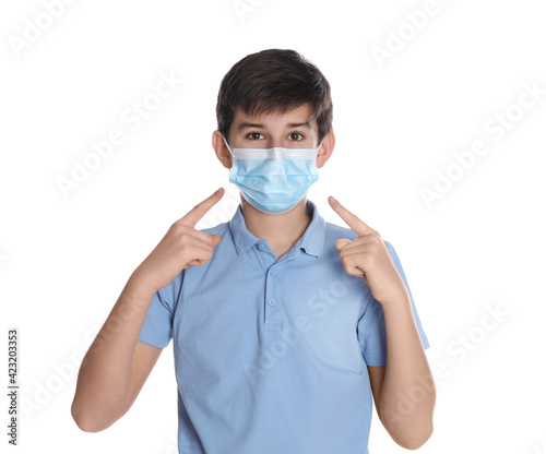 Boy wearing protective mask on white background. Child safety