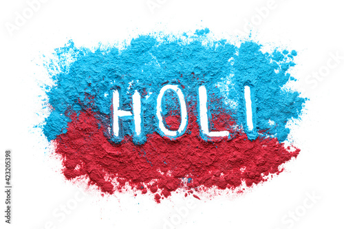 Colorful powders with word Holi on white background, top view photo