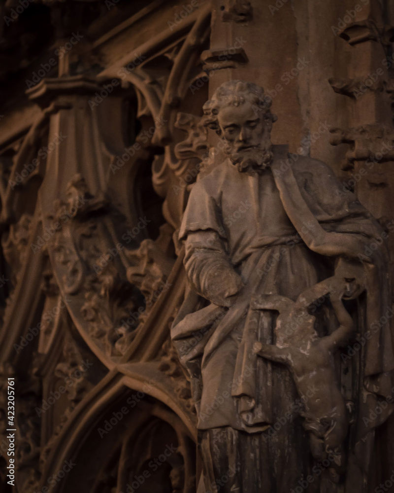 STRASBOURG, FRANCE - 19 April , 2019: Part of interior of famous Strasbourg cathedral, catholic gothic church, historical heritage. Timelees spirit, beautiful sculpture.