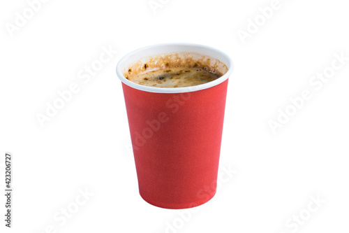 Coffee in a red paper cup on a white background close up side view