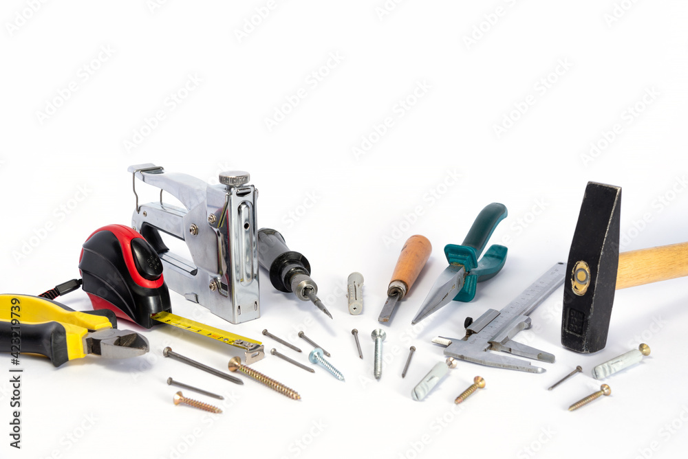 Repair tools and various parts on a white background Repair tools and various parts on a white background