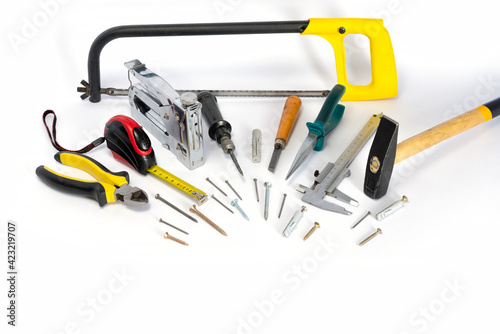 Repair tools and various parts on a white background