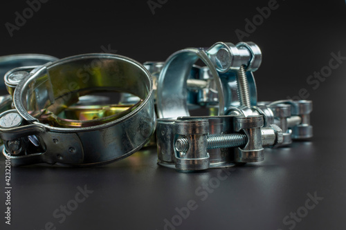 reinforced metal clamps on a black background