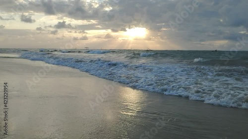 Wallpaper Mural Porto de Galinhas beach. The sun over sea. Amazing sunrise and waves on beach. Torontodigital.ca