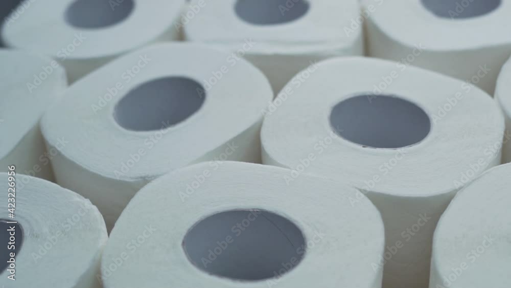 White Soft Multi-Layer Toilet Paper in Rolls, Macro. Sanitary accessories for the Toilet. Insulated Background made of Rolls of High-Quality Toilet Paper. White Soft Multi-Layer Toilet Paper in Rolls, Macro. Sanitary accessories for the Toilet. Insulated Background made of Rolls of High-Quality Toilet Paper.