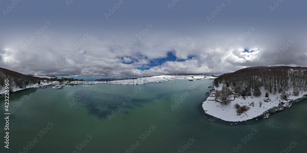 360 degree virtual reality panorama of Lake Biviere immersed in the beautiful beech forest of Monte Soro in winter on Nebrodi, Sicily, Italy. Natural lake with views of Mount Etna and the sea. Sicily.