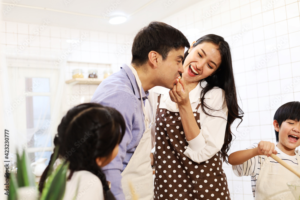 Happiness young couple family smile and childhood resting at kitchen in holiday weekend. Happiness young couple family smile and childhood resting at kitchen in holiday weekend.