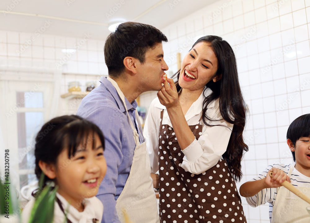 Happiness young couple family smile and childhood resting at kitchen in holiday weekend. Happiness young couple family smile and childhood resting at kitchen in holiday weekend.