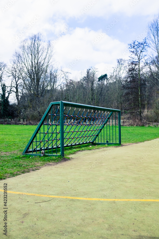 Outdoor football pitch with goals and soccer nets in public park Outdoor football pitch with goals and soccer nets in public park