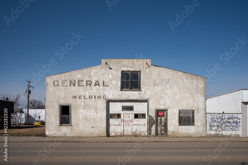 Old abandoned service station in the town of Foremost.