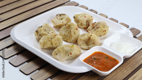 Veg steam momos. Momos stuffed with vegetables and then cooked and served with sauce