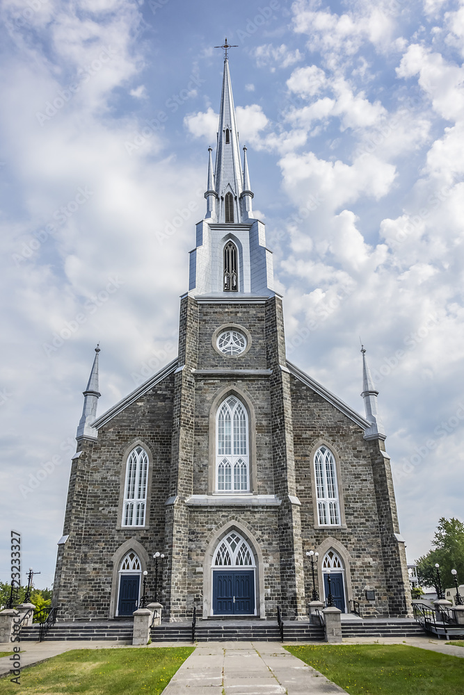 Obraz premium View of Church of St. Patrick (Paroisse-de-Saint-Patrice, 1855) in Village Riviere-du-Loup (200 kilometers east of Quebec City). Quebec province, Canada.