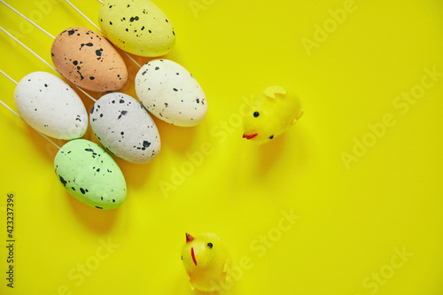 Easter eggs on yellow background. Happy Easter. Holiday concept.