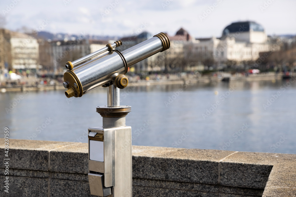 antiques old interesting observation platform binoculars for city and landscape sightseeing made of metal and golden copper, side view, by day, without perons antiques old interesting observation platform binoculars for city and landscape sightseeing made of metal and golden copper, side view, by day, without perons