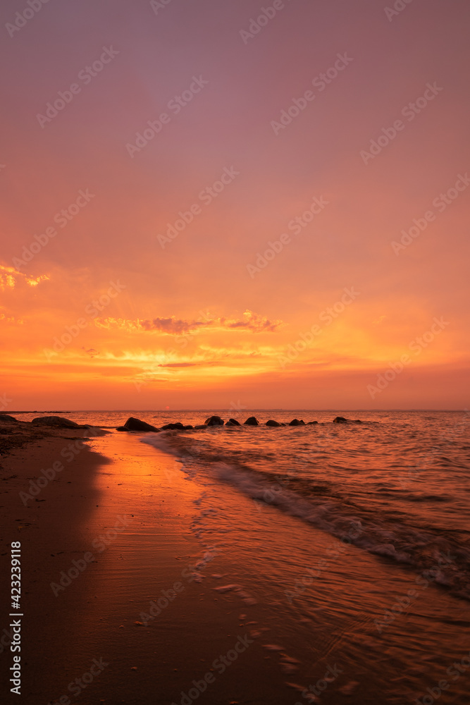 stunning seascape with bright red evening sky