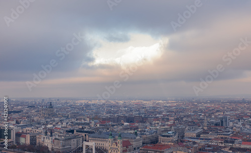 Hole in the clouds above Budapest. Cloudy winter day. © Krisztian