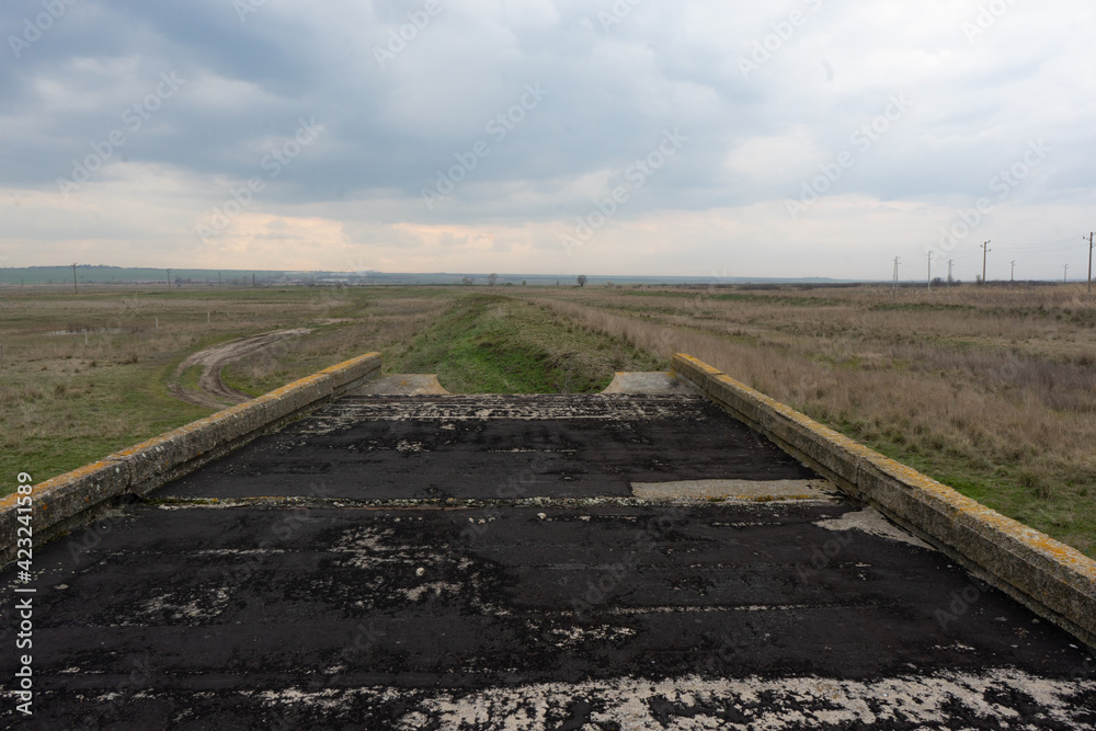 The road to nowhere, the break of the structure and around the field. The buildings of the past are just in the field