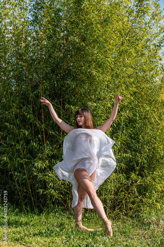 dancer in various poses in the environment of nature