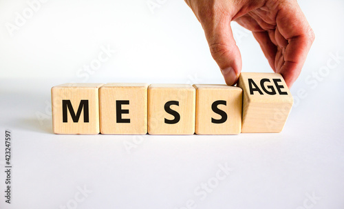 Wallpaper Mural Make your mess your message symbol. Businessman turns cubes and changes the word 'mess' to 'message'. Beautiful white background, copy space. Business and make your mess your message concept. Torontodigital.ca
