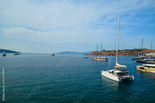 Yachts parked in marina. The Aegean coastline of Bodrum in September 2020. Bodrum Peninsula is one of the most summer destinations of Turkey located between the Aegean and Mediterranean Seas. © Iryna