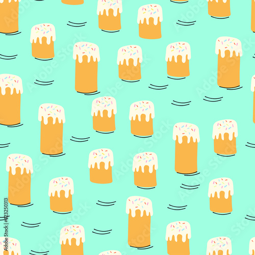 Seamless pattern with Easter cake in different sizes on a blue background